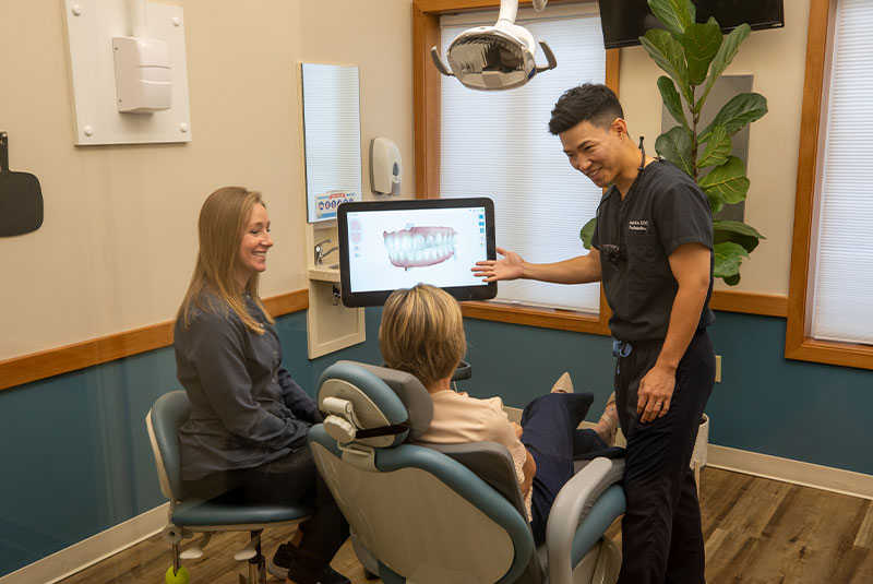 Dr. Lee consulting with patient