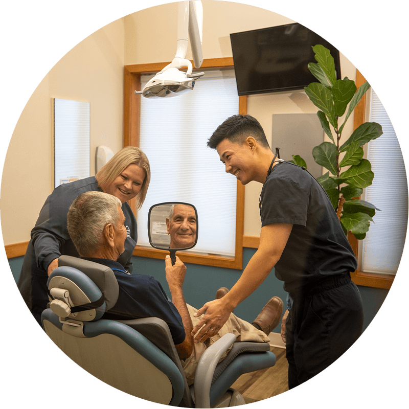 dr.lee with patient after dental procedure