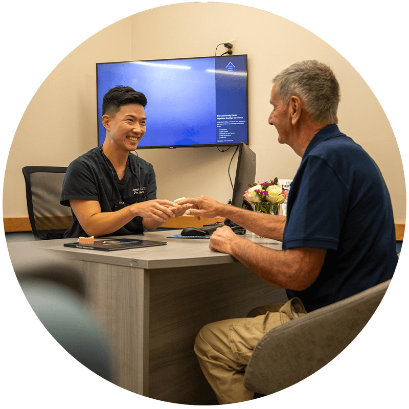 Dr. less shaking hands with patient